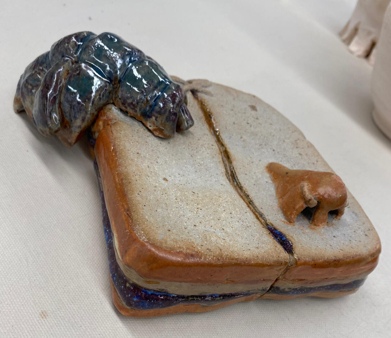 Self Portrait, 2024 (stonewear, colored slip, glaze)